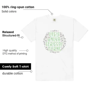 Essential Vapor Green Life Turns Graphic Shirt features