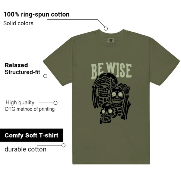 NB 9060 Dark Olivine Green Be Wise Graphic Shirt features