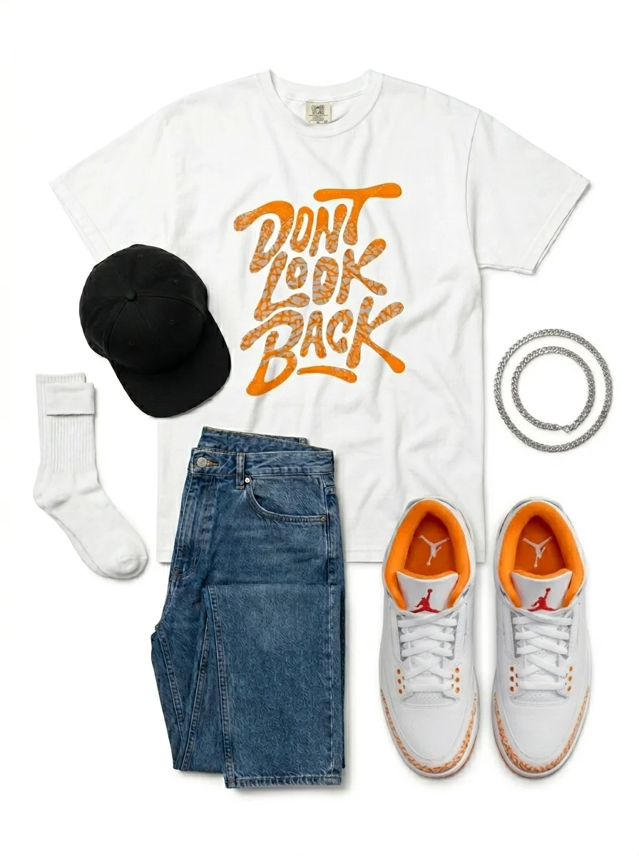 Misunderstood Match flat-lay - white heavyweight comfort colors tee with the drippy bear graphic: orange citrus bear face filled with grey elephant print texture, dripping orange detail, handwritten misunderstood script below paired with the Air Jordan 3 Retro Orange Citrus