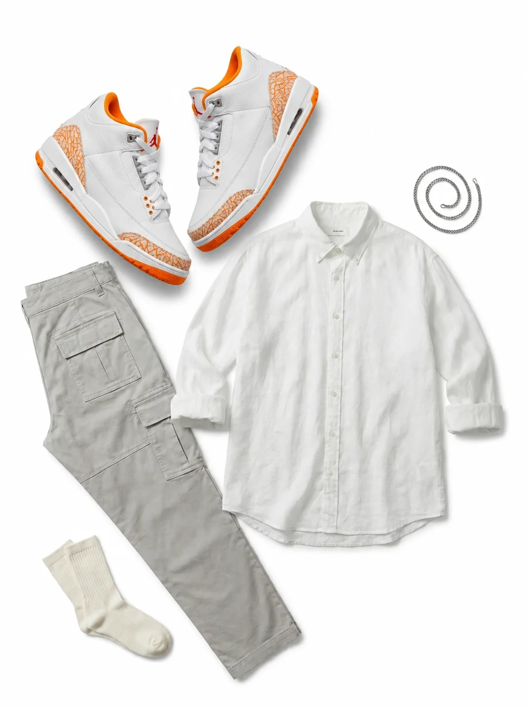 White Ledge flat-lay - oversized white linen button-down, sleeves rolled, worn untucked paired with the Air Jordan 3 Retro Orange Citrus