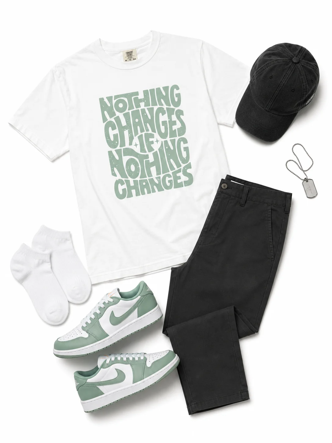 Mist on the Fairway flat-lay - oversized cream cotton oxford shirt, relaxed open collar, untucked paired with the Air Jordan 1 Low G 'Steam'